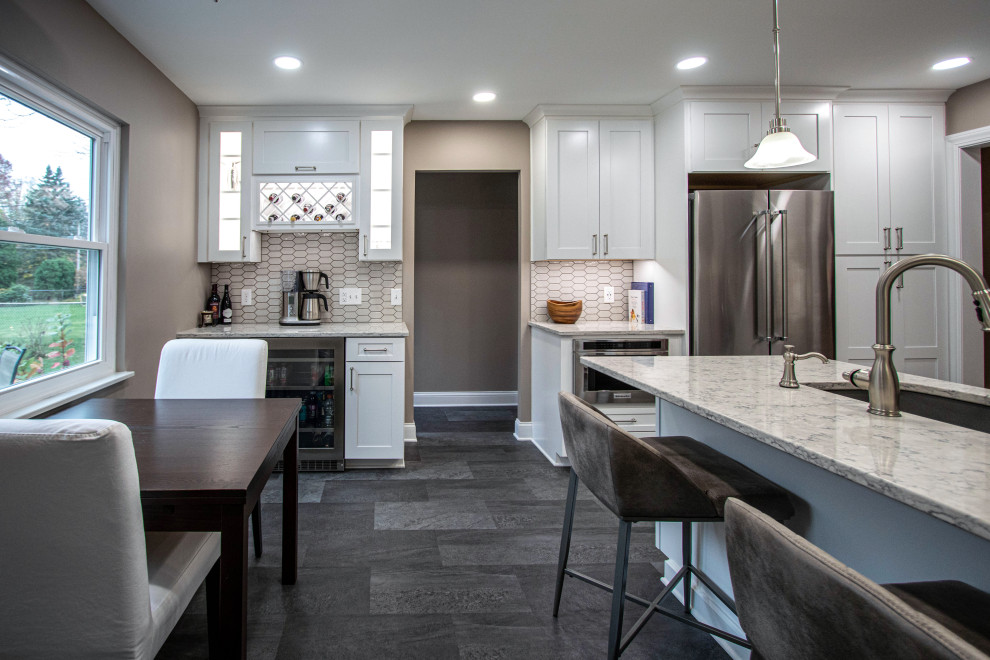 Grey and White Shaker Kitchen with Quartz Countertops and Picket-Style ...