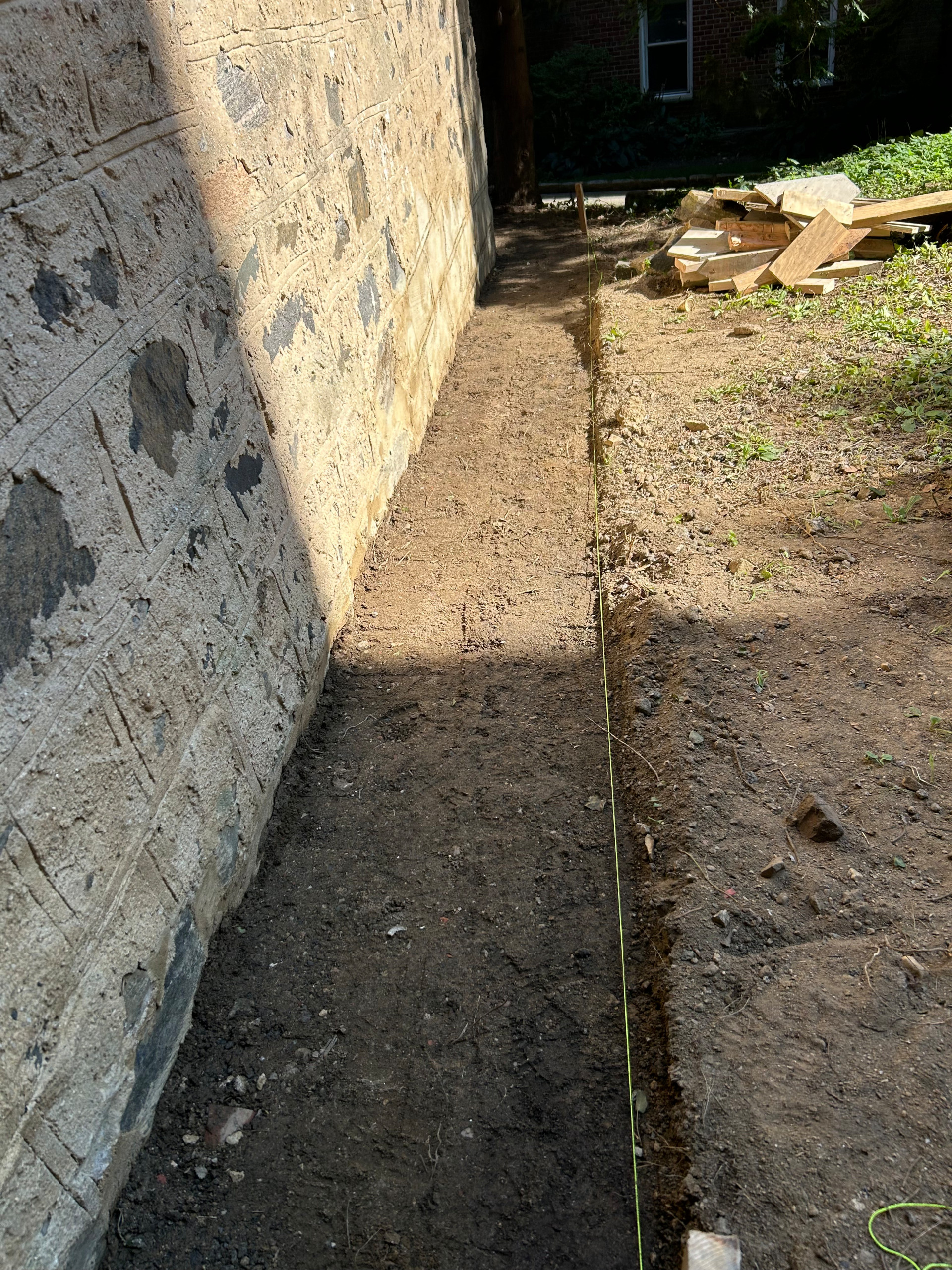Curb/Exterior Wall Stucco/ParaPro Flashing/Garage slab replacement/Drainage