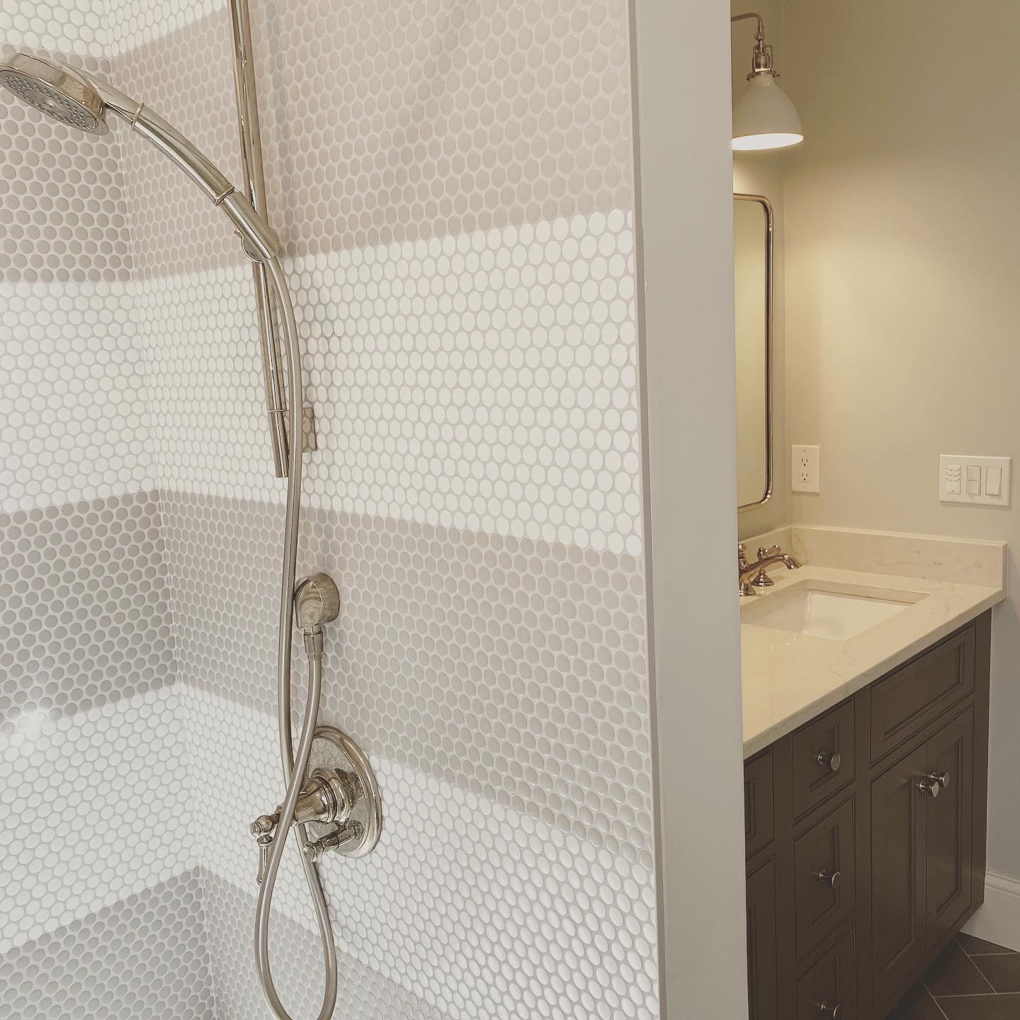 Kid's Bathroom with Penny Tile striped shower