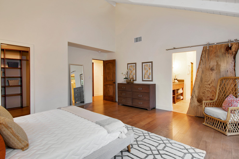 Inspiration for a rustic bedroom remodel in San Diego