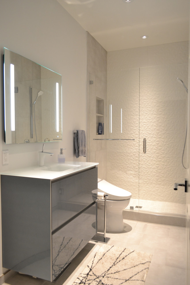 Mid-sized modern 3/4 bathroom in San Francisco with flat-panel cabinets, grey cabinets, an alcove shower, a bidet, white tile, porcelain tile, ceramic floors, a vessel sink, white floor, a hinged shower door, white benchtops, a single vanity and a freestanding vanity.