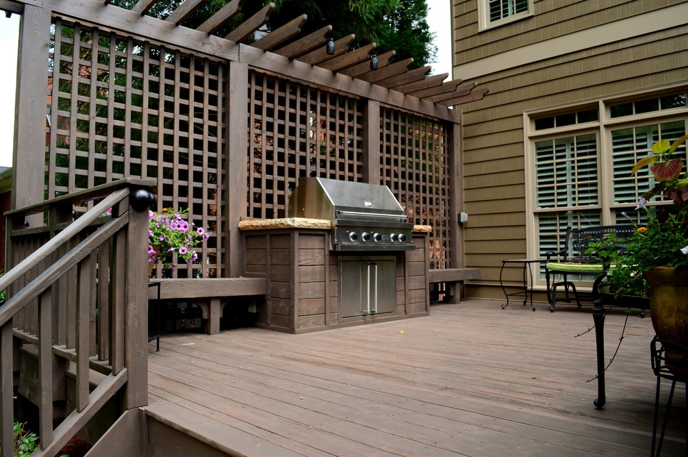 Inspiration for a mid-sized transitional backyard deck in Atlanta with no cover and an outdoor kitchen.