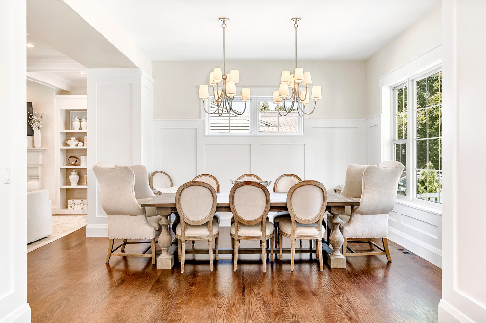 Example of a transitional dining room design in Denver