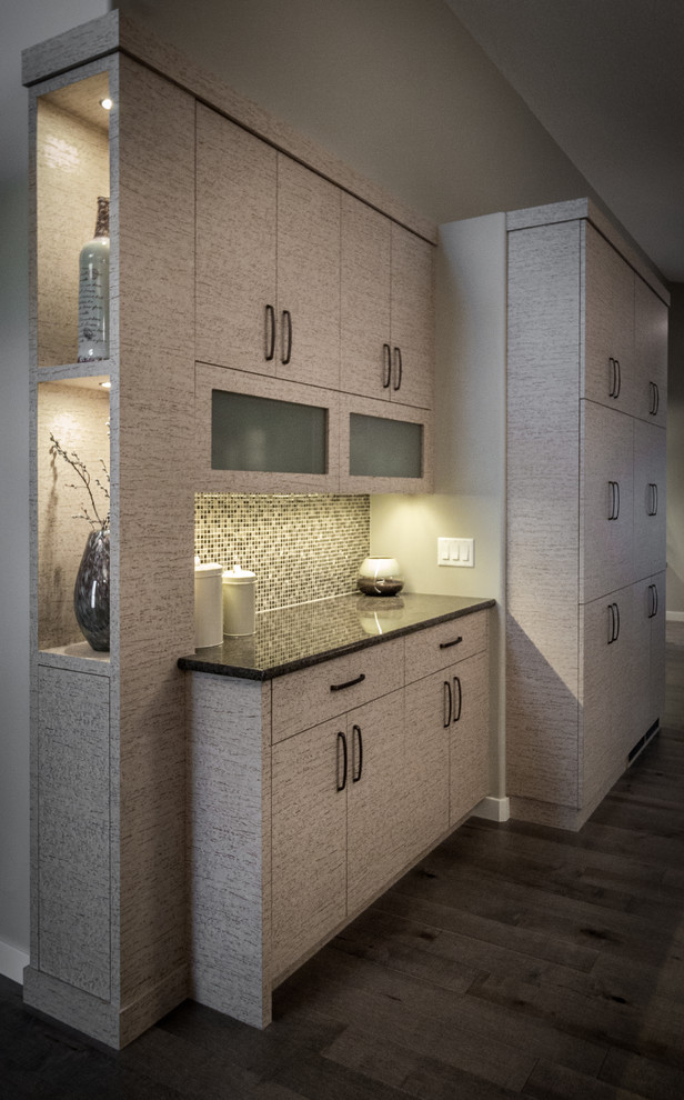 Inspiration for a mid-sized modern u-shaped medium tone wood floor and gray floor enclosed kitchen remodel with a double-bowl sink, flat-panel cabinets, beige cabinets, granite countertops, multicolored backsplash, mosaic tile backsplash, stainless steel appliances and a peninsula