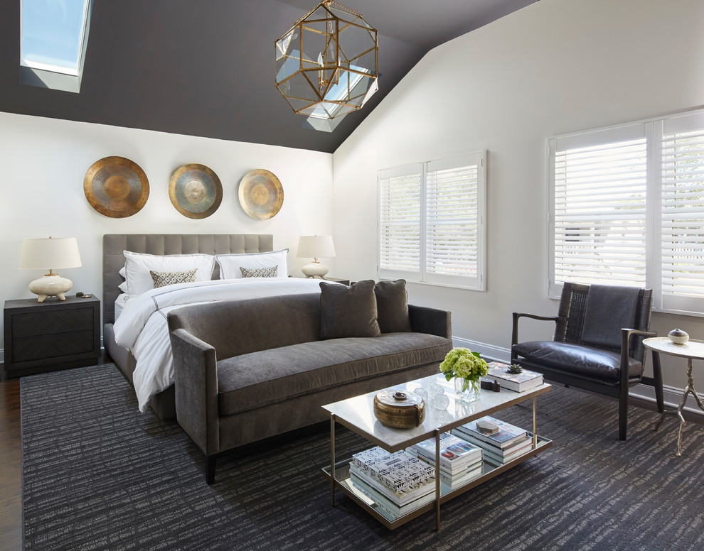 Design ideas for a transitional bedroom in Chicago with white walls.