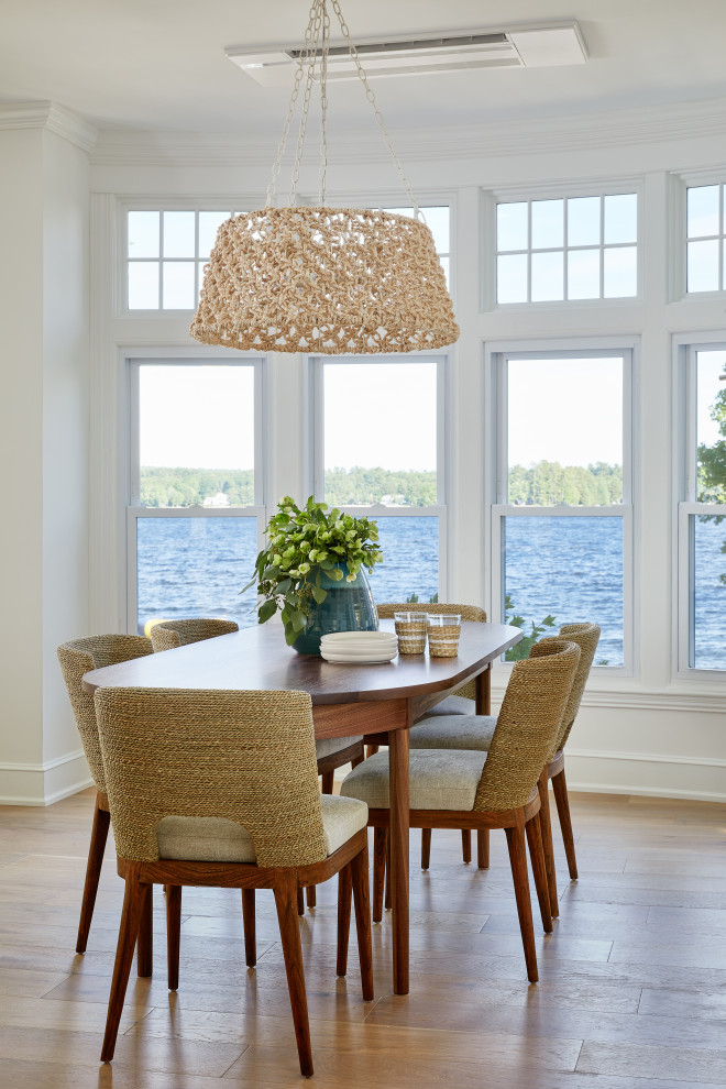 Mid-sized beach style dining room in Portland Maine.