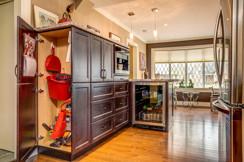Example of a transitional kitchen design in Toronto