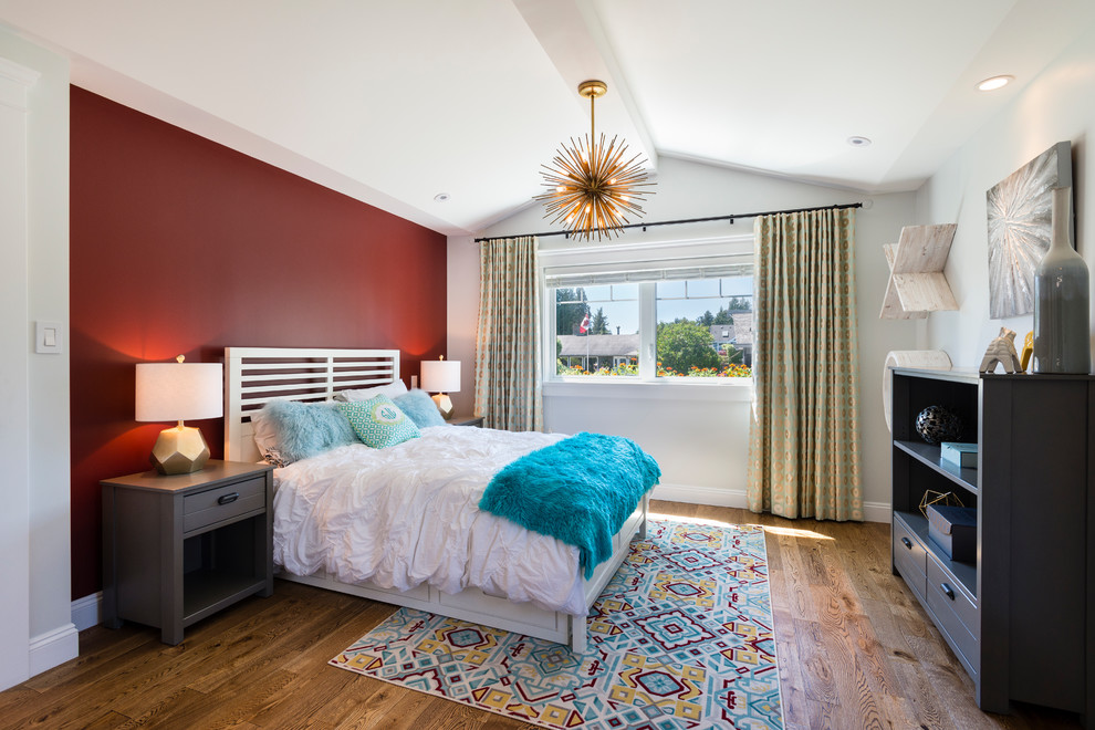 Photo of a mid-sized transitional bedroom in Vancouver with red walls, medium hardwood floors and brown floor.
