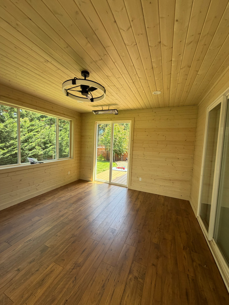 A new large window in back and a sliding door on each side