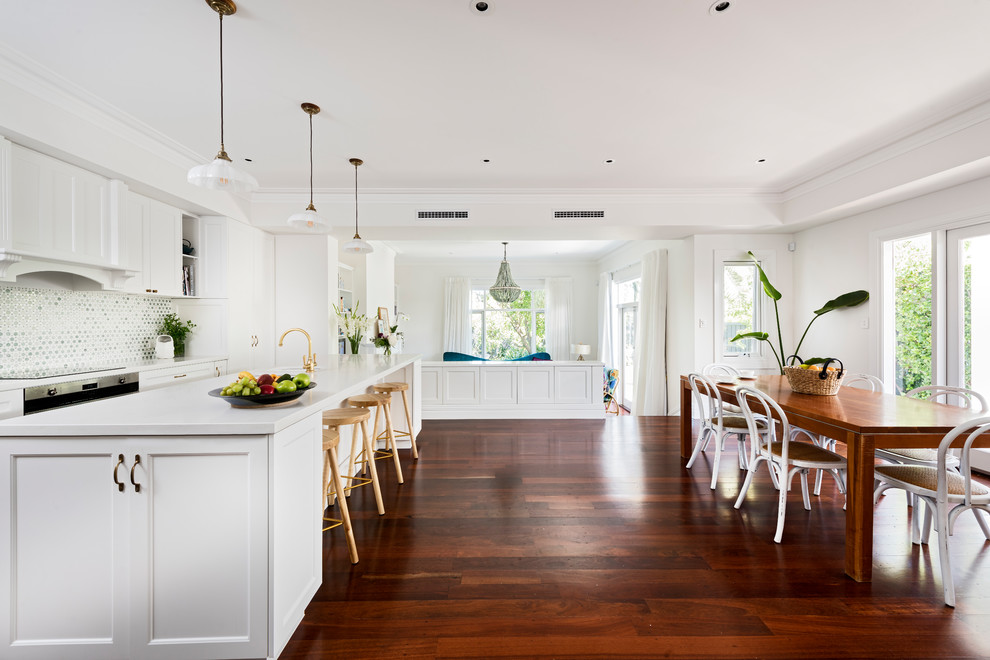 Large beach style open plan dining in Perth with white walls, medium hardwood floors and no fireplace.