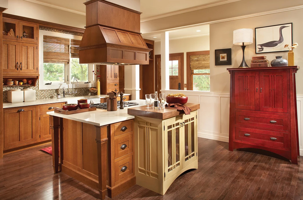 Mid-sized transitional galley dark wood floor and brown floor eat-in kitchen photo in Chicago with a farmhouse sink, shaker cabinets, medium tone wood cabinets, quartz countertops, beige backsplash, mosaic tile backsplash and an island