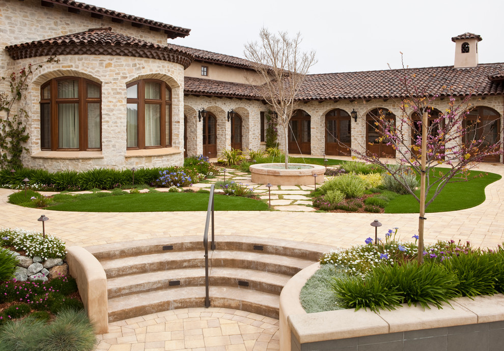 This is an example of a mediterranean exterior in San Francisco with stone veneer.