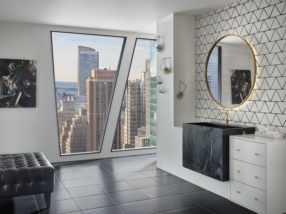 Photo of a large contemporary master bathroom in Chicago with furniture-like cabinets, white cabinets, white tile, ceramic tile, white walls, ceramic floors, a vessel sink, wood benchtops and black floor.