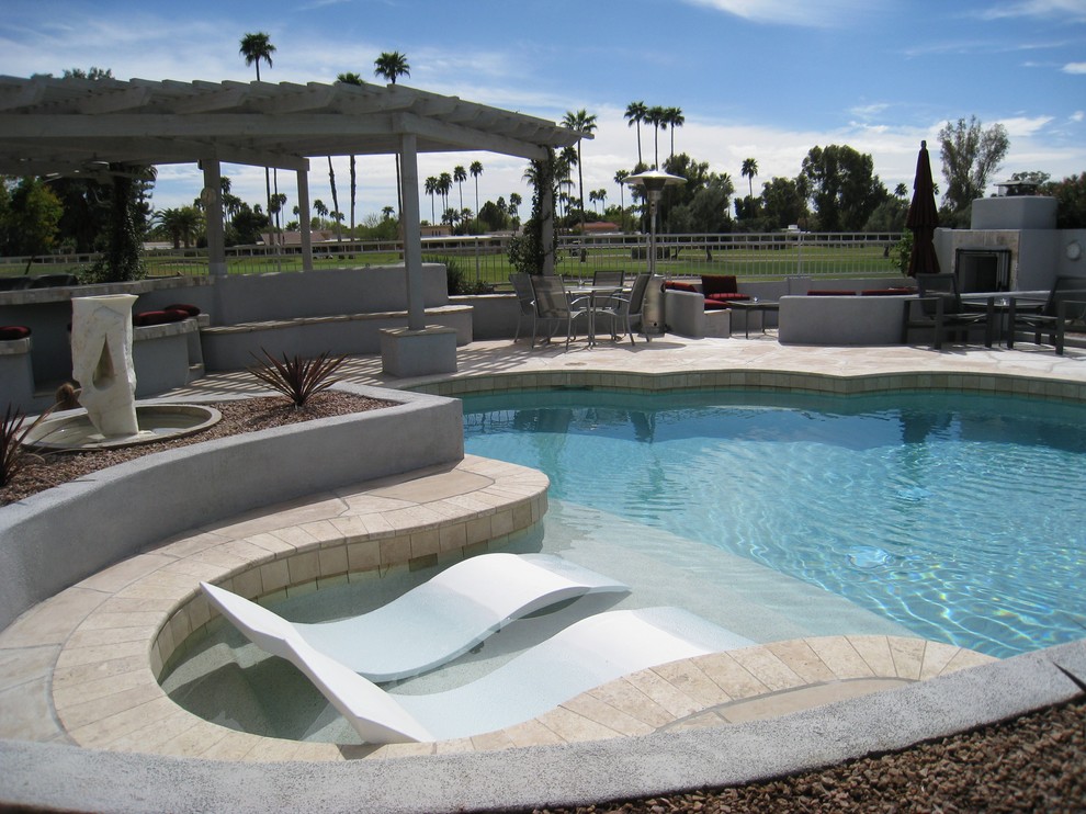 Design ideas for a mid-sized contemporary backyard custom-shaped pool in Houston with tile.