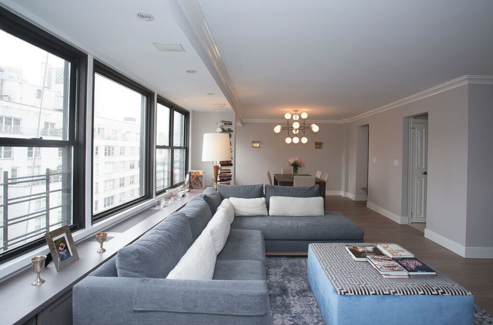 Mid-sized transitional open concept dark wood floor and brown floor family room photo in New York with gray walls
