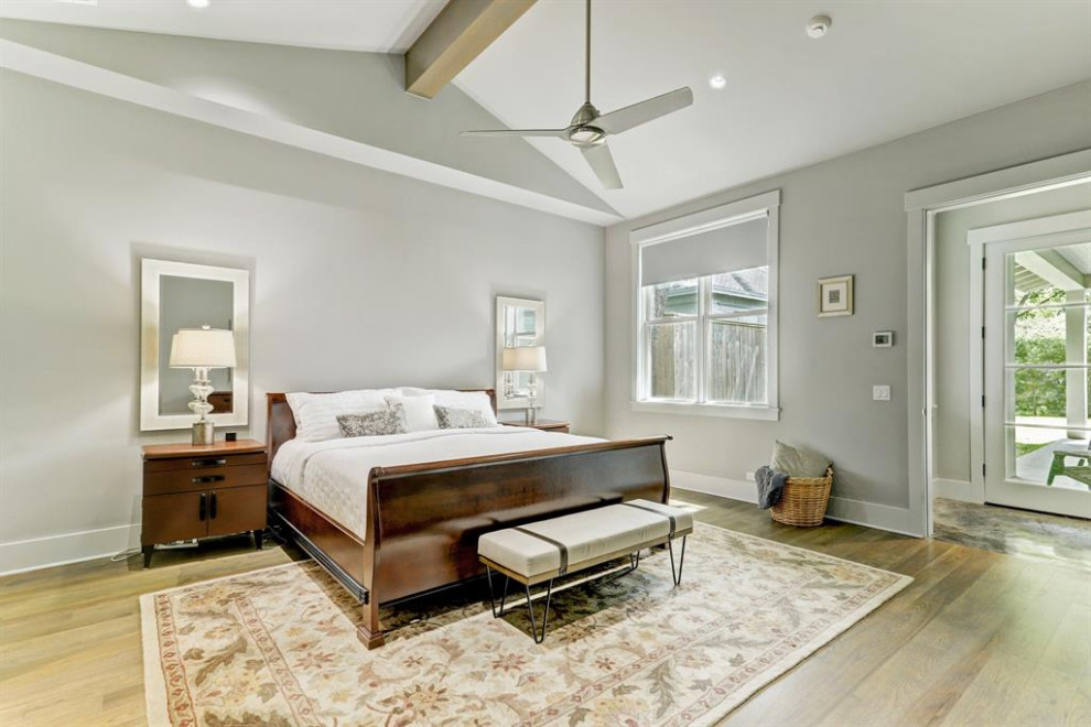 Design ideas for a transitional bedroom in Houston.