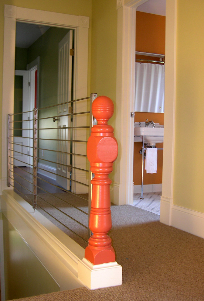 This is an example of a mid-sized traditional staircase in Minneapolis.