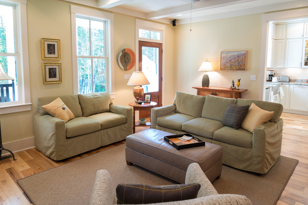 This is an example of a country living room in Other with yellow walls.