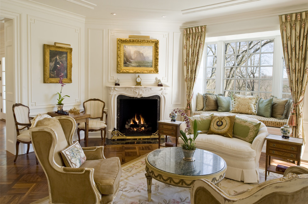 Inspiration for a traditional living room in Philadelphia with a corner fireplace and white walls.