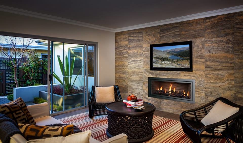 Photo of a mid-sized contemporary enclosed living room in Other with beige walls, dark hardwood floors, a ribbon fireplace, a tile fireplace surround, a wall-mounted tv and brown floor.