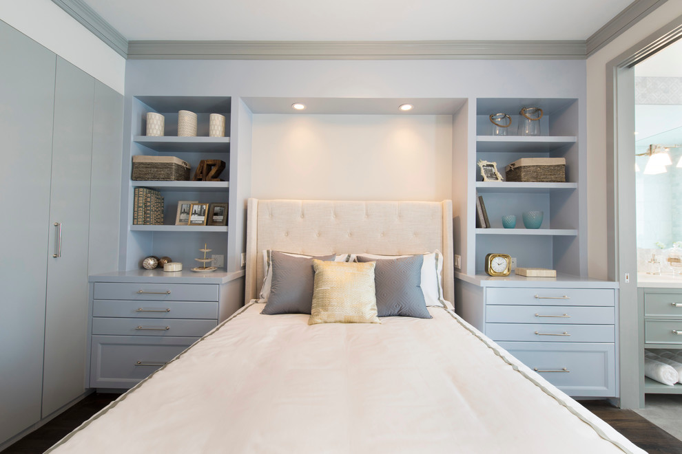 Photo of a transitional master bedroom in San Francisco with white walls and dark hardwood floors.