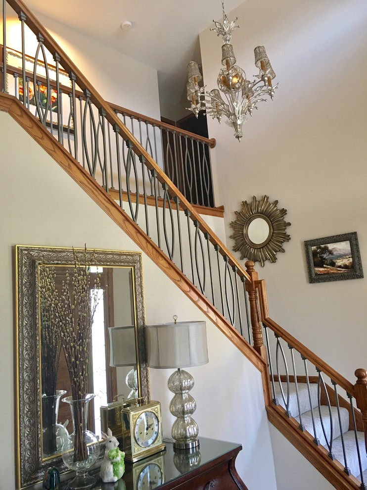 Large transitional foyer photo in Minneapolis with beige walls