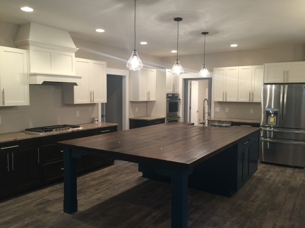 Transitional/contemporary kitchen with large island