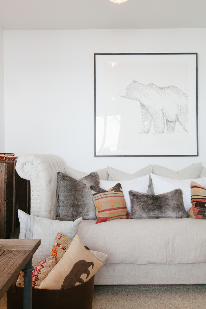 Inspiration for a rustic carpeted home office remodel in Orange County with white walls