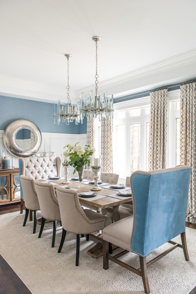 Enclosed dining room - large transitional medium tone wood floor and brown floor enclosed dining room idea in Toronto with blue walls and no fireplace