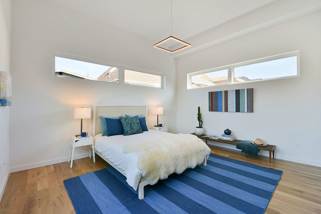 Bedroom Full Of Natural Wood White Walls And Abundant Light