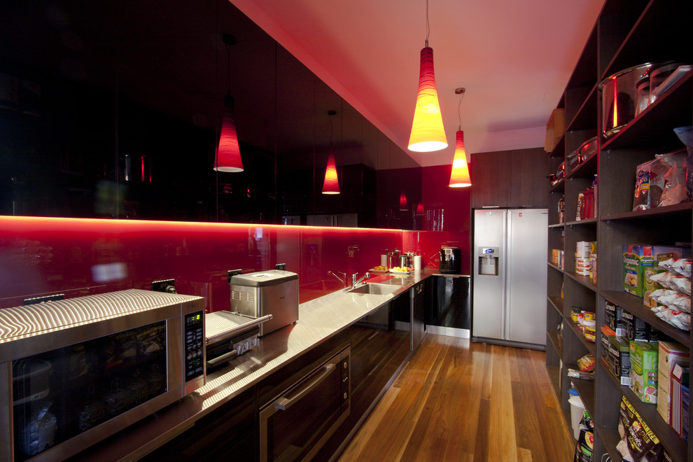 This is an example of a contemporary kitchen in Brisbane with stainless steel appliances.