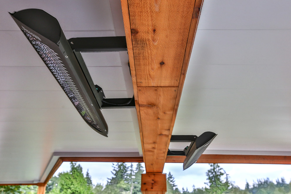 Inspiration for a large modern backyard deck remodel in Seattle