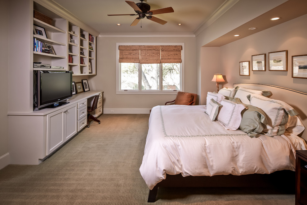 Traditional bedroom in Houston with beige walls, carpet and no fireplace.