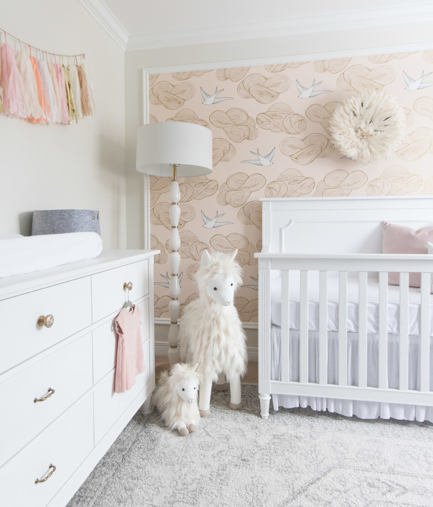 This is an example of a mid-sized traditional nursery for girls in Ottawa.
