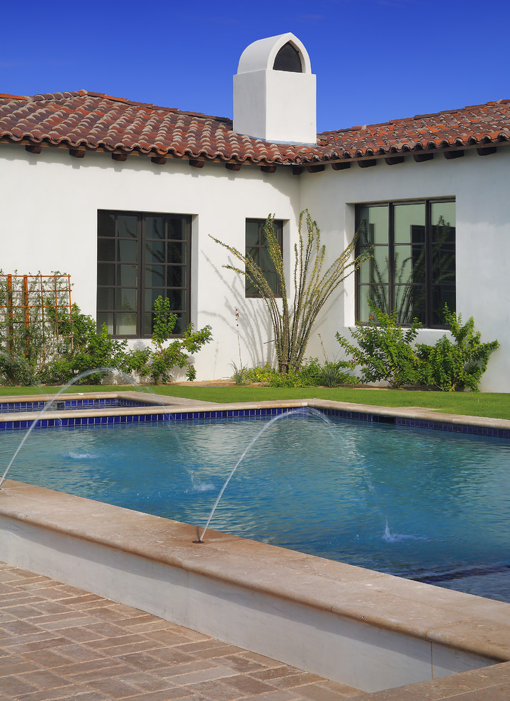 This is an example of a mediterranean rectangular pool in Phoenix.