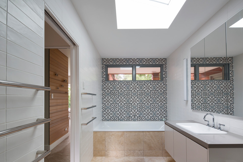 Photo of a contemporary bathroom in Sydney with cement tile.