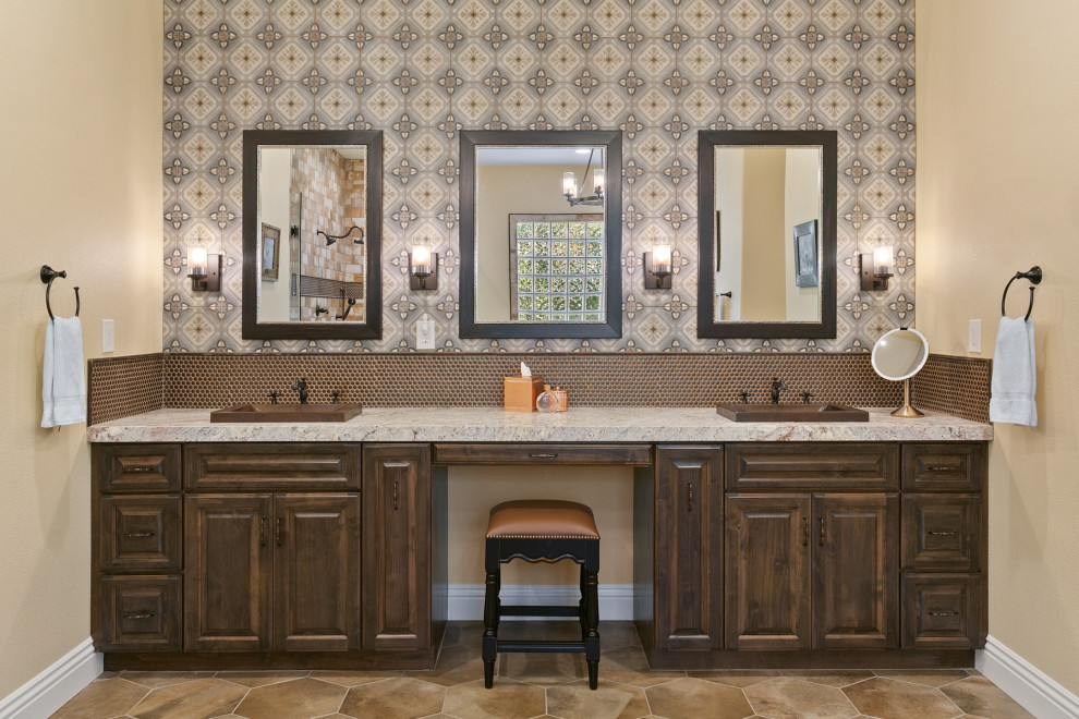 Design ideas for a large mediterranean master bathroom in Other with raised-panel cabinets, medium wood cabinets, beige walls, a drop-in sink, brown floor, grey benchtops, a double vanity, a built-in vanity and wallpaper.