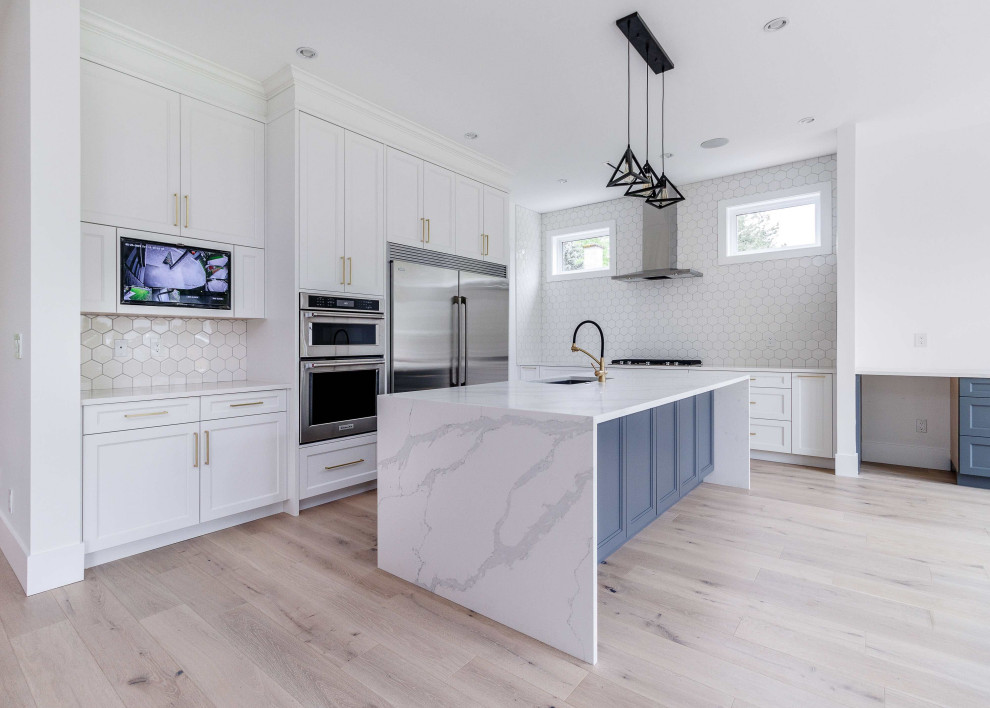 Example of a transitional kitchen design in Vancouver