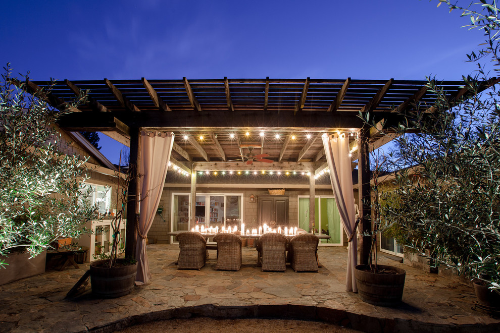Large country backyard patio in San Francisco with a pergola.
