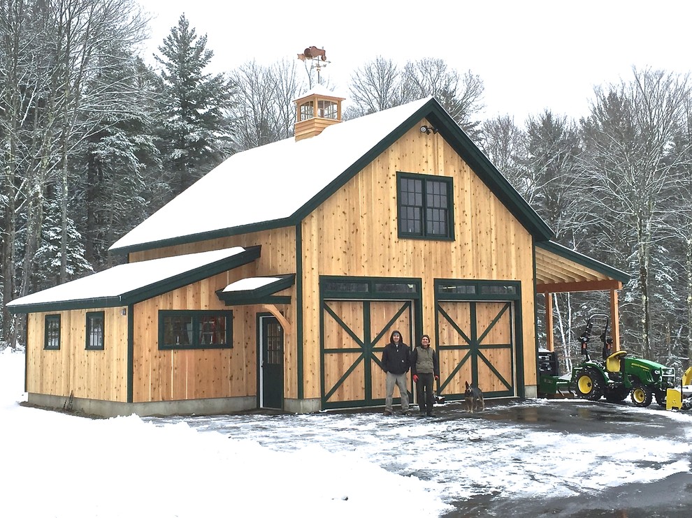 Photo of a mid-sized traditional detached two-car workshop in Burlington.