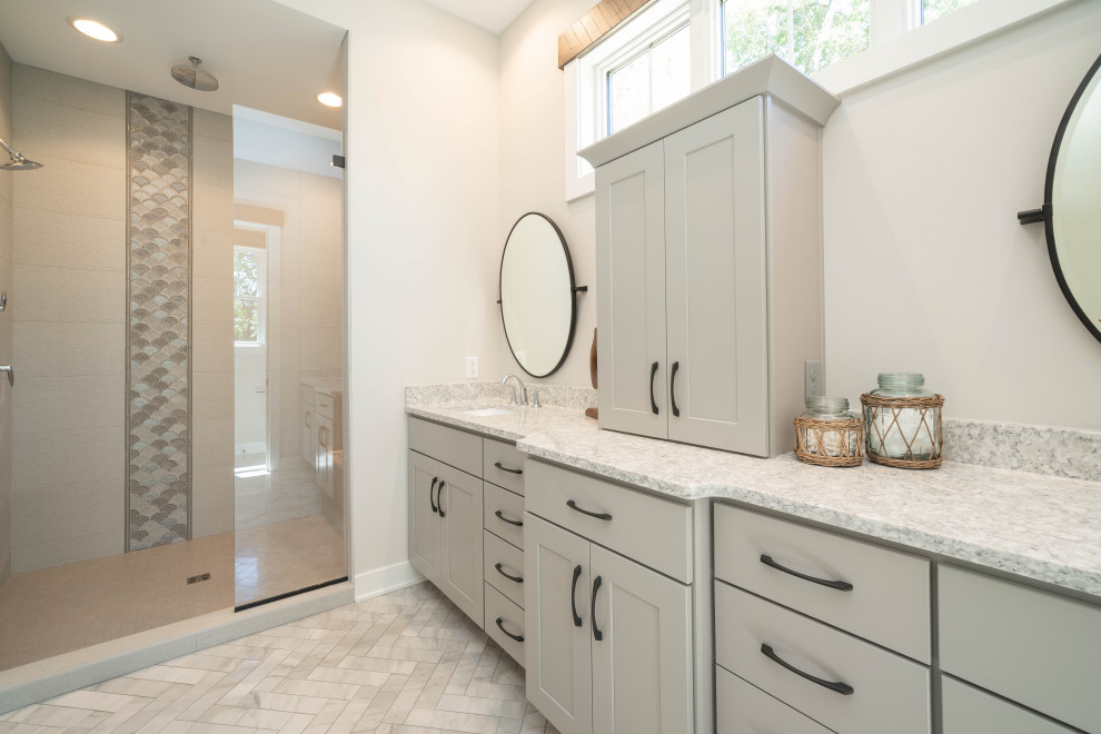 This is an example of a large eclectic master bathroom in Grand Rapids with shaker cabinets, grey cabinets, white walls, light hardwood floors, quartzite benchtops, brown floor, blue benchtops, a double vanity, a built-in vanity and exposed beam.