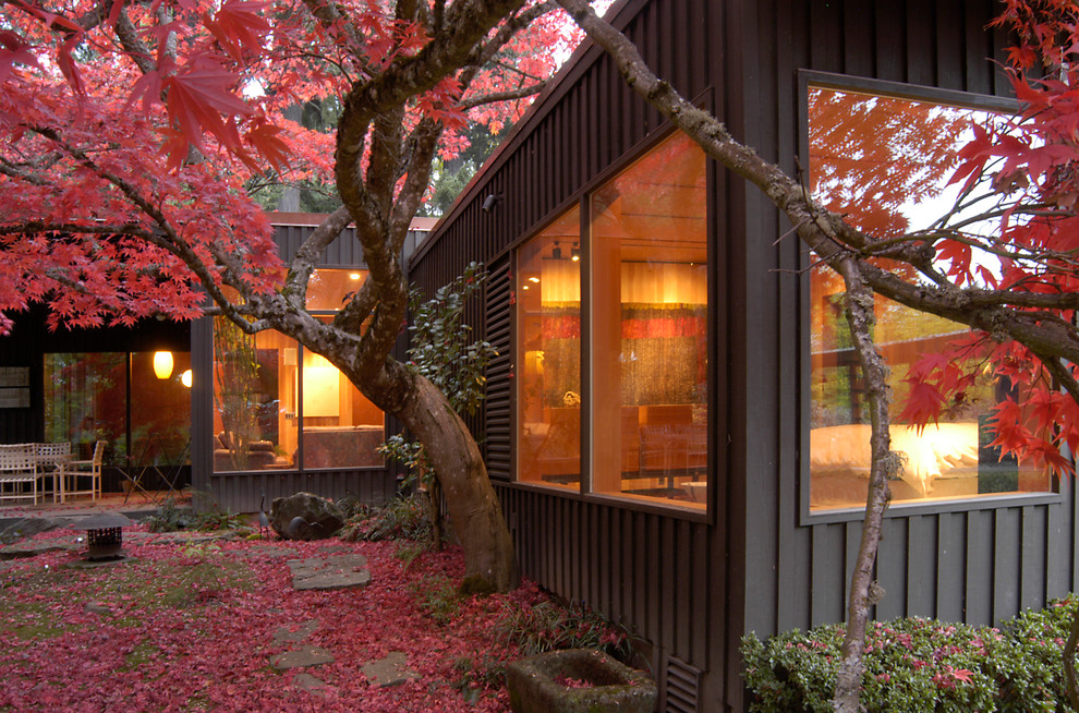 This is an example of a mid-sized contemporary backyard garden for fall in Portland.