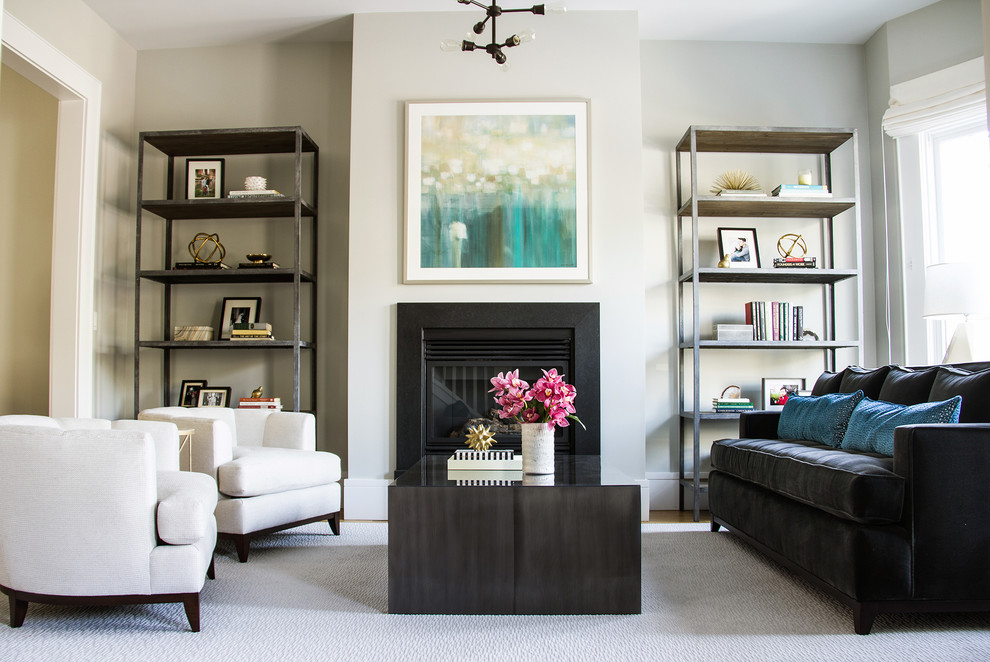 Photo of a mid-sized transitional formal enclosed living room in San Francisco with grey walls, light hardwood floors and a standard fireplace.