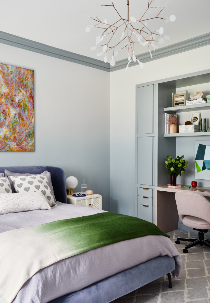 Scarsdale home - Key decor elements include:
Wallpaper: Aurora Mist wallpaper by Calico
Chandelier: Herculaneum pendant light by Moooi
Art above bed: Ho Sook Kang
Art at desk: Untitled by Agnes Barley from Sears Peyton Gallery
Bed: Desdemone bed from Ligne Roset with Capuchine fabric from Casamance
Nightstands: Renwick nightstand from Anthropologie
Bedside lamp: Tip of the Tongue lamp from The Future Perfect
Desk chair: Saarinen Advanced chair from Knoll Studio in Canvas fabric by Kvadrat
Desk lamp: Modo lamp by Roll and Hill
Throw: Fade throw from ALT for Living
Bed linens: Linen Orchid duvet cover from CB2