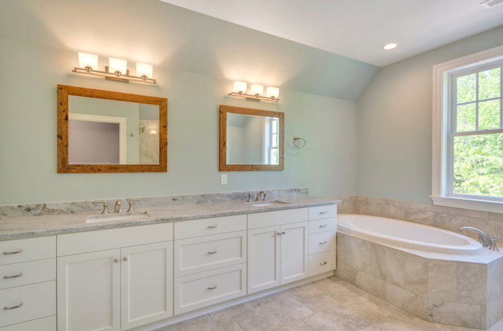 Photo of a large country master bathroom in Other with shaker cabinets, a drop-in tub, an open shower, gray tile, marble, grey walls, ceramic floors, engineered quartz benchtops and a hinged shower door.
