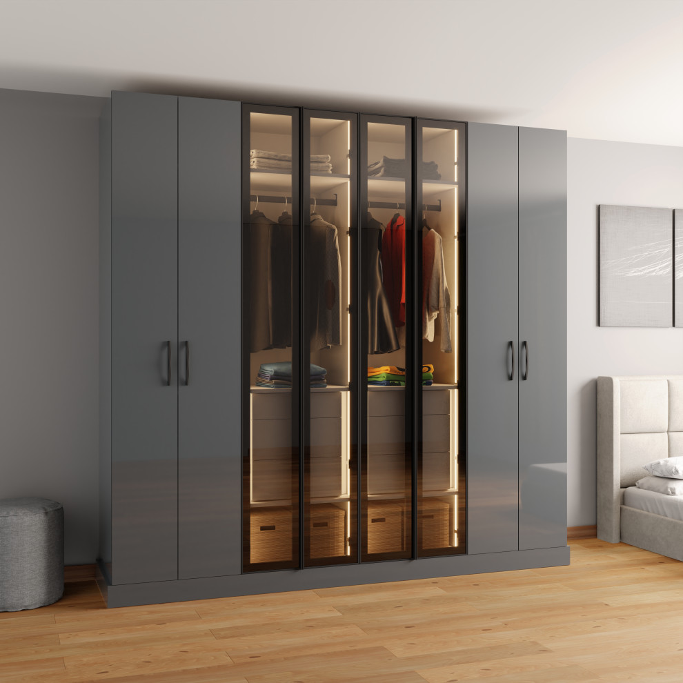 Esempio di un armadio incassato unisex minimalista di medie dimensioni con ante lisce e ante grigie