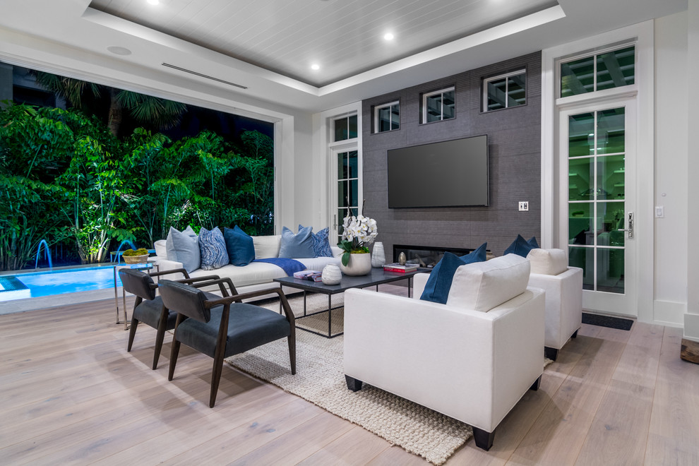 Large beach style open concept living room in Miami.