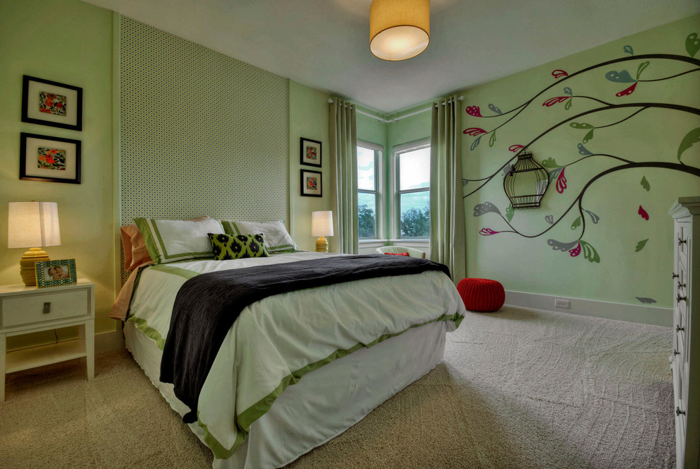 Photo of a mid-sized transitional kids' room for girls in Austin with green walls and carpet.