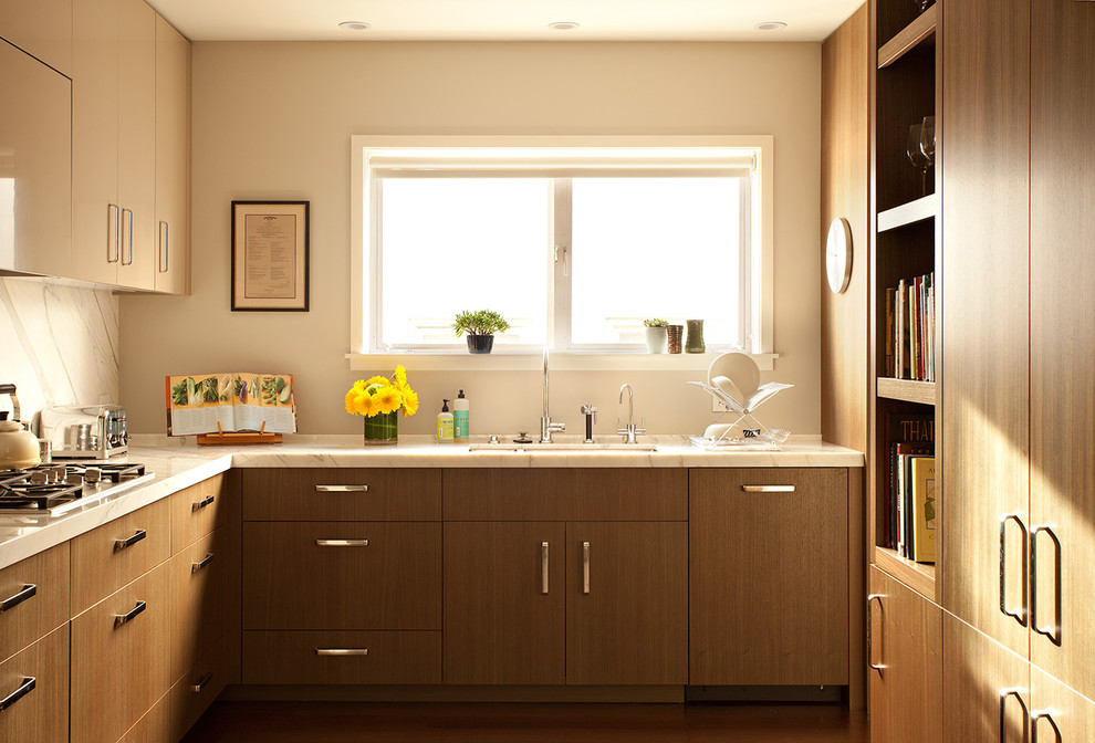 Modern u-shaped separate kitchen in San Francisco with flat-panel cabinets, medium wood cabinets and no island.