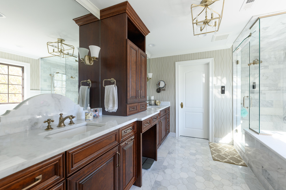 This is an example of a transitional master bathroom in Other with raised-panel cabinets, dark wood cabinets, a corner shower, grey walls, an undermount sink, white floor, a hinged shower door and white benchtops.